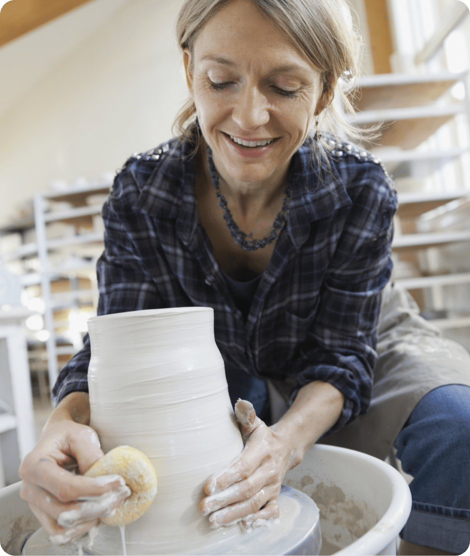 Woman making pottery